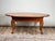 This really great solid cherry coffee table reflects the enduring elegance of the Queen Anne style, likely produced by...