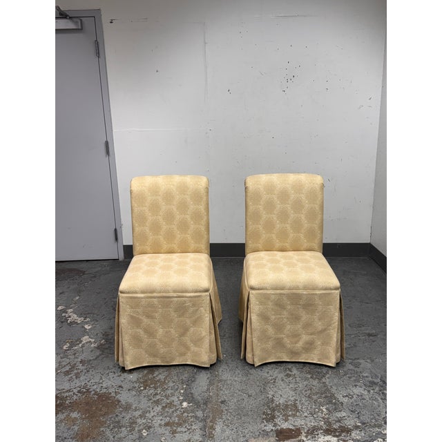 Design Plus Gallery presents a Pair of Custom Design Side Chairs by unknown brand. Each chair offers a rolled back that...
