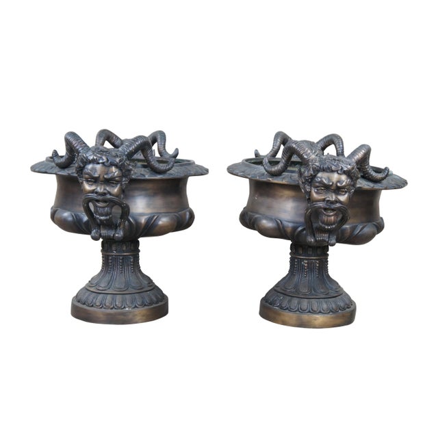 Exceptional set of footed bronze tazza urns. Features traditional Grecian form with gadrooned body and flared mouth with...