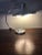 This Space Age table lamp in satin-finish steel has a newly replaced neon circle light. European Plug (up to 250V).The...