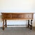 This elegant vintage Jacobean-style sideboard brings timeless charm to any home. Crafted from rich walnut and burl wood,...