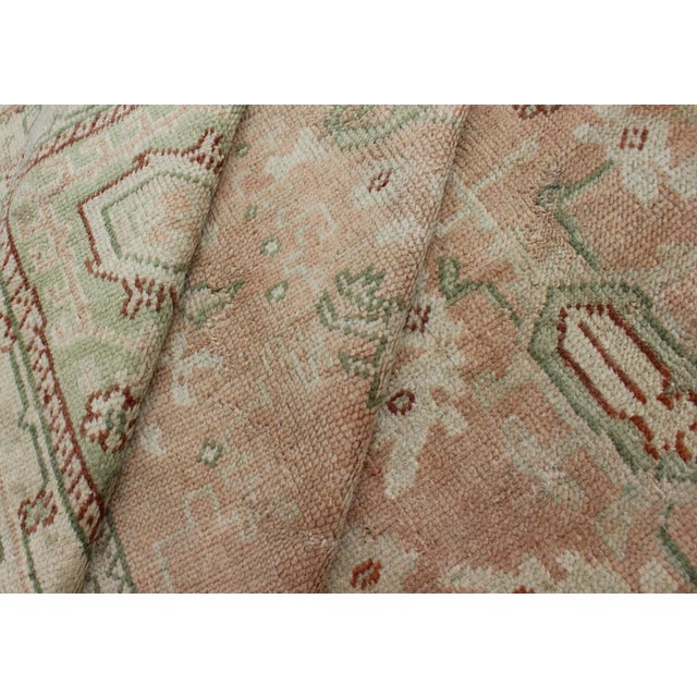 Classic All Over Design Antique Oushak Rug in Light Coral and Light Green For Sale - Image 11 of 12