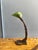 Bank Lamp with Cast Iron Base and Enameled Metal Shade, 1920s, in Good conditions. Designed 1920 to 1949 Up to 250V...
