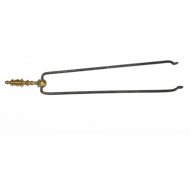 Antique early 19th century American Federal brass and iron fireplace tongs. Wonderful brass finial with pleasing mellow...