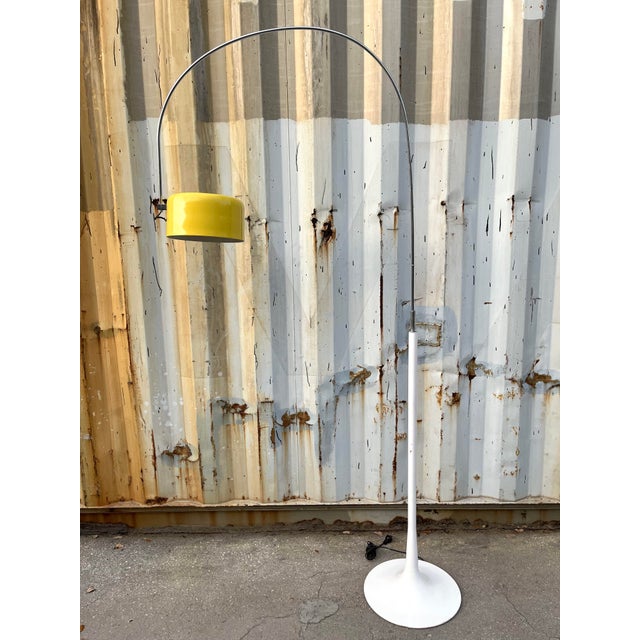Vintage Mid Century Modern Floor Lamp in the Joe Colombo Style. Circa 1970s Features a metal round base with rotating...