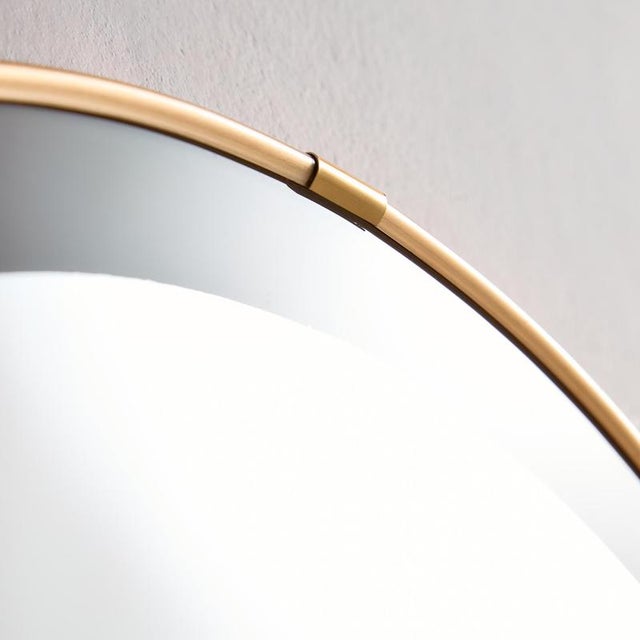 Gold plated metal framed mirror with milk glass frame from the 1970s. with some surface scratches, stains and wear, but in...