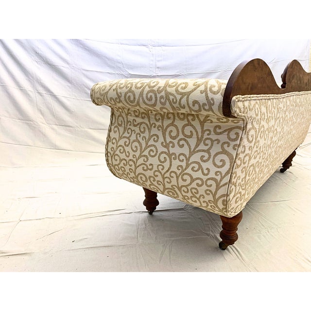 An elegant 19th-century Classical Revival sofa boasting a storied Canadian maritime lineage connected to the historic...