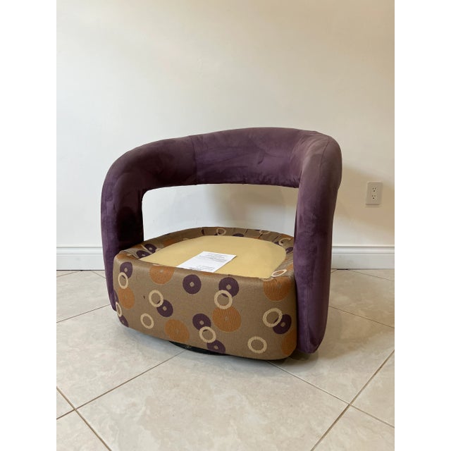 Sculptural “Targa” Swivel chair by Weiman Preview in suede and fabric.