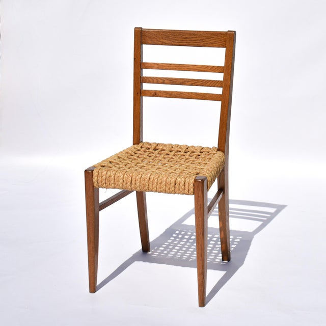 Pair of beech wood armless chairs designed by husband and wife duo Adrien Audoux and Frida Minet for Vibo Vesoul, with...
