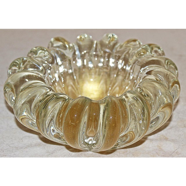 Solid and substantial Ventian-Murano glass candy or nut bowl with the classic 24k gold flecked hand blown glass. Can make...