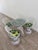 Great set design spun fiberglass mid-century modern table and 4 chairs includes a very fresh tropical green seat cushions....