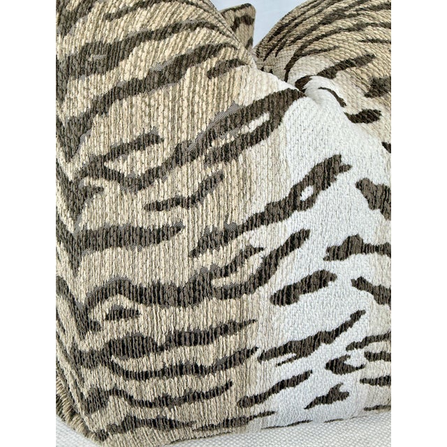 Custom pair of 22" pillows covered in a tiger print chenille fabric in light neutrals. These pillows have tapered corners...
