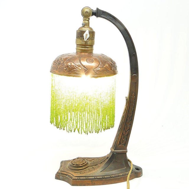 Table lamp, produced at the beginning of the twentieth century in Austria-Hungary. It is made of metal, decorated with...