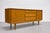 Mid Century Modern Scandinavian sideboard, c. 1960’s. Crafted in oak, the piece showcases beautiful natural grain...