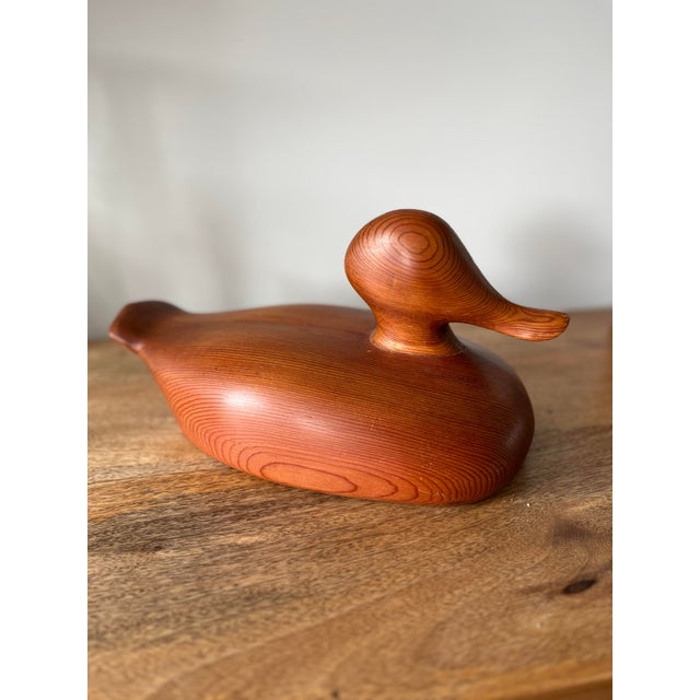 This hand-carved wooden duck decoy is a gorgeous piece of New England folk art to add to your collection. The beautiful...