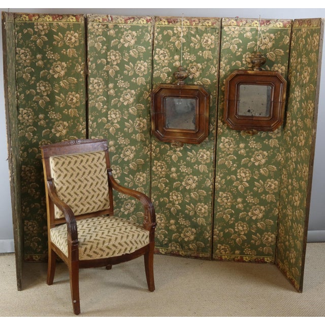 Pair of octagonal mirrors in natural wood with light arms. Probably from the second half of the 19th century. Dimensions:...