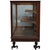 Antique country store display case, circa 1920, constructed of oak with glazed sides and sliding glass doors. The interior...