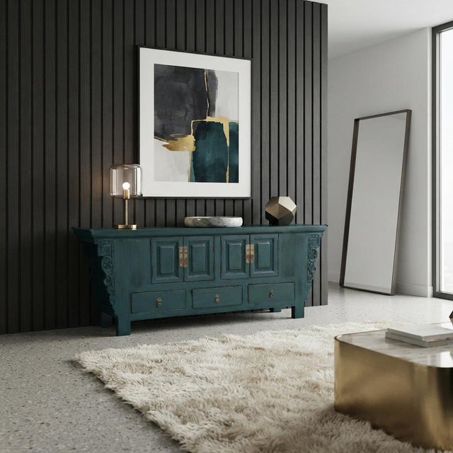 The Asian Distressed Rustic Teal Blue Low TV Console Table Cabinet with relief carving around the apron is a charming...
