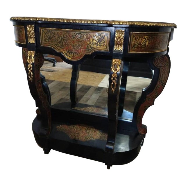Inlaid all over with symmetrical displays of stylised foliage in brass and red-stained tortoiseshell, the D-shaped top...