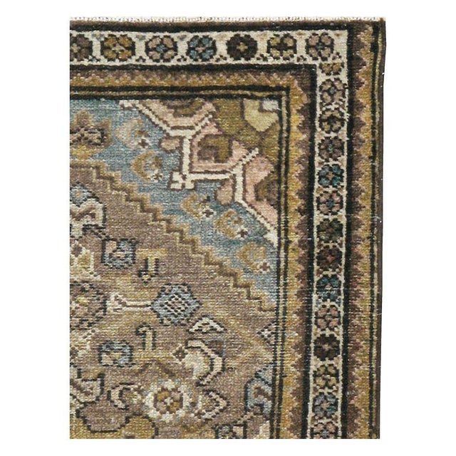 An antique Persian Malayer throw rug handmade during the early 20th century. Measures: 2' 4" x 3' 8".