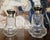 Pair of antique Louis XVI style crystal and silver bottles, finely engraved and decorated with delicate floral motifs....
