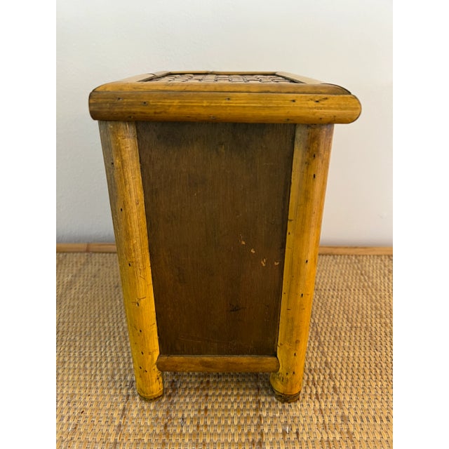 Vintage thick bamboo chest with woven rattan top and two pullout drawers. Can also be used as a plant stand or table riser.