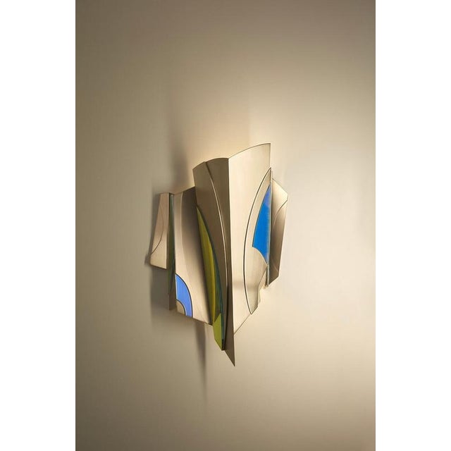 Geometric cross bitume xl wall lamp by jennifer midoz dimensions: d 35 × w 16 × h 53 cm materials: brushed chromed brass...