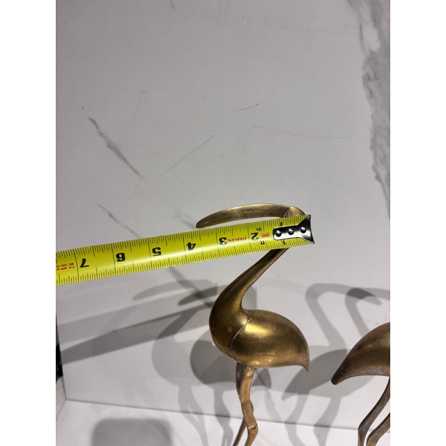 Brass A Pair of Vintage Solid Brass Crane Figurines Standing Gracefully on Round Bases With a Warm, Aged Patina. For Sale - Image 8 of 12