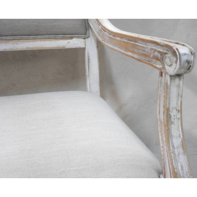 We are offering a superb Louis XVI style hall bench settee. It has a painted and distressed finish, featuring disrupted...