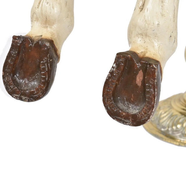 Vintage C.W. Parker carousel horse is embossed with the makers mark on one of its hooves. Perfectly captured in all it’s...