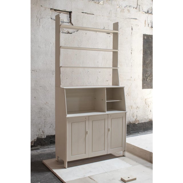 Swedish Modern Bookcase Hutch Credenza With Storage Cabinet, designed by Carl Malmsten. Upper piece has three shelves and...
