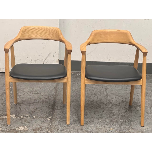 Design Plus Gallery presents a Pair of Hiroshima Armchairs from Interior Icons. These chairs are remarkable pieces of...
