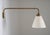 This Swedish telescoping wall lamp, crafted during the 1940s, blends utility with timeless elegance. Its extendable arm,...