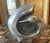 Contemporary curved duck sculpture in pewter on wood base with marking. The wood base is 2 inches tall - 9 inches long - 3...
