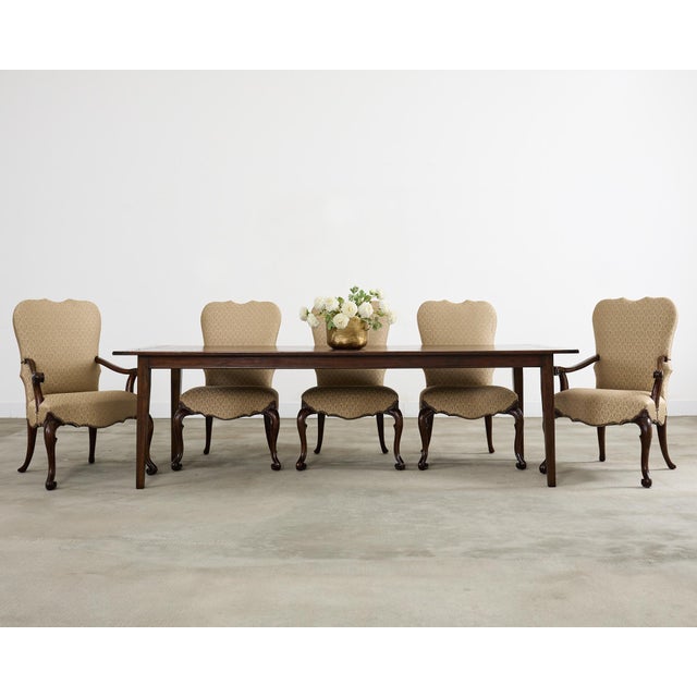 Opulent set of ten grand walnut dining chairs designed by Therien Studio Workshop for Dessin Fournir. The bespoke set...