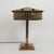 Embossed brass lamp decorated with dots and lines, square lampshade pierced on all four sides of its base with oval...