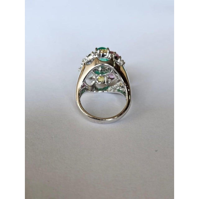 A very gorgeous and beautiful, modern style, Emerald & Multi Sapphires Cocktail Ring set in 18K White Gold & natural...