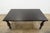 This traditional-style dining table features a rich dark wood finish and classic turned legs that give it a timeless,...