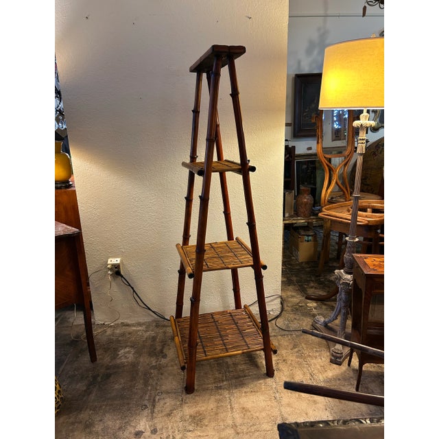 Boho Chic Fold Up Etagere Crafted With A Bamboo Frame With Four Rattan Shelves.