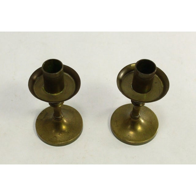 A great pair of early diminutive brass candleholders Most likely doll house miniatures Very well crafted cast and shaved...