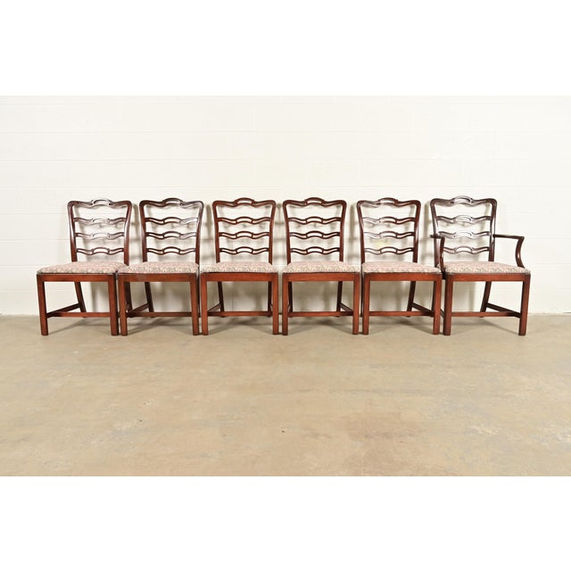 A gorgeous set of six Georgian or Chippendale style dining chairs In the manner of Baker Furniture USA, Circa Mid-20th...