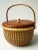 This beautifully handcrafted vintage Nantucket Lightship Basket is a signed piece, marked by the artisan on the underside....