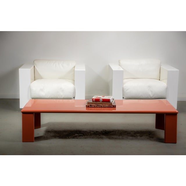 Ming coffee table with is elongated design by Kazuhide Takahama known for his eyecatching designs in high gloss finishes...