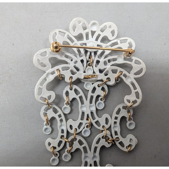 Vintage 1970s Signed Monet Goldtone White Enamel Dangle Brooch For Sale In Philadelphia - Image 6 of 7