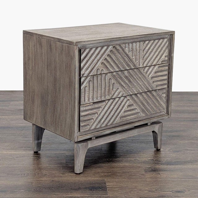Two drawer nightstand with textured drawers. Brand: Coaster. Dimensions (in): 27W x 19D x 27H.