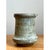 This stoneware pitcher takes a distinctly architectural, hourglass-inspired form, its body tapering inward at the midpoint...