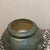 1970s Antique Bronze-Inspired Ceramic Vase – Weathered Patina Vase With Lion Crest For Sale - Image 5 of 10
