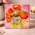 A vibrant original floral still life painting featuring bold poppy blooms in a colorful vase, perfect for cottagecore...