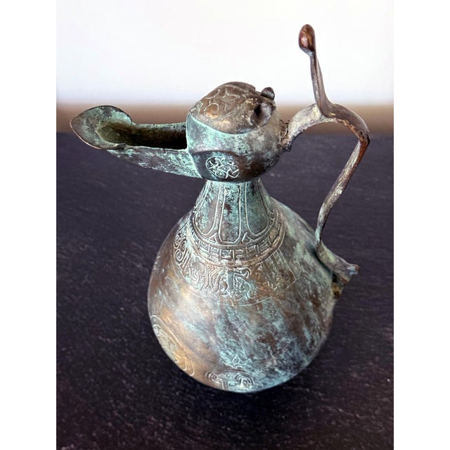 Verdigris Medieval Islamic Bronze Ewer with Incised Motifs Seljuk Empire For Sale - Image 8 of 18