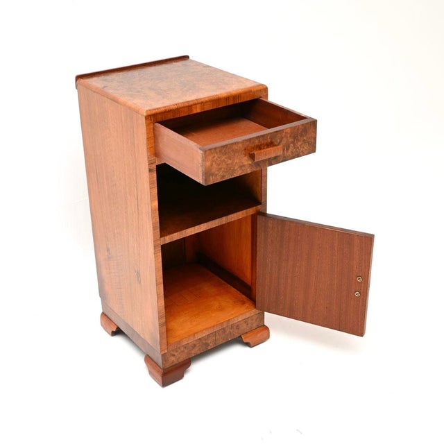 A stunning Art Deco burr walnut bedside cabinet, this was made in England and dates from the 1930’s. It is a lovely,...